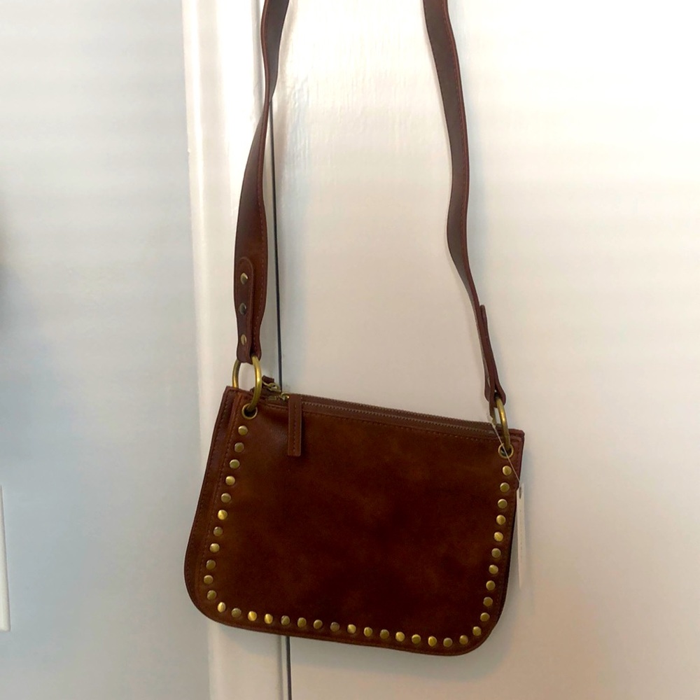 NWOT brown leather crossbody with gold grommets.
